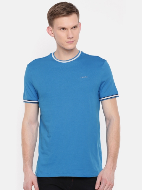 

Calvin Klein Jeans Men Blue Solid Round Neck T-shirt