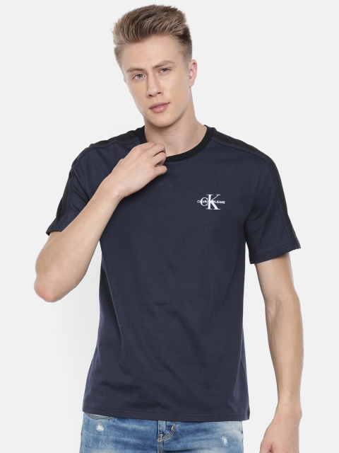 

Calvin Klein Jeans Men Navy Blue Solid Round Neck T-shirt