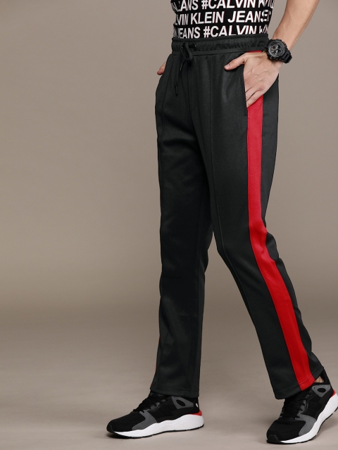 

Calvin Klein Jeans Men Solid Straight Fit Track Pants With Stripes, Black
