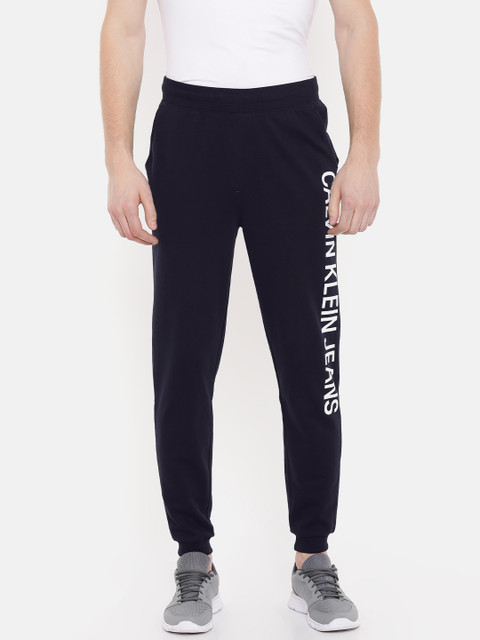 

Calvin Klein Jeans Men Navy INSTITUTIONAL SIDE LOGO Solid Joggers, Navy blue
