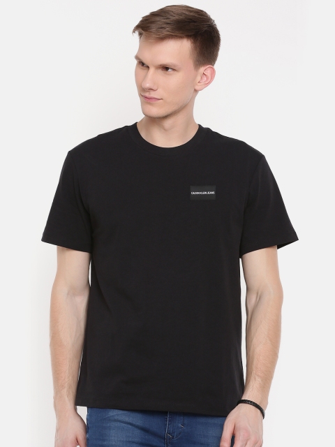

Calvin Klein Jeans Men Black Solid Round Neck T-shirt