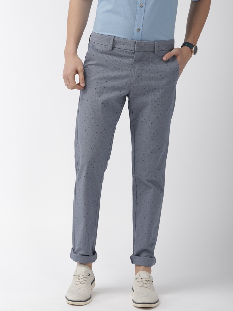 

Indian Terrain Men Blue Brooklyn Slim Fit Self Design Smart Casual Regular Trousers