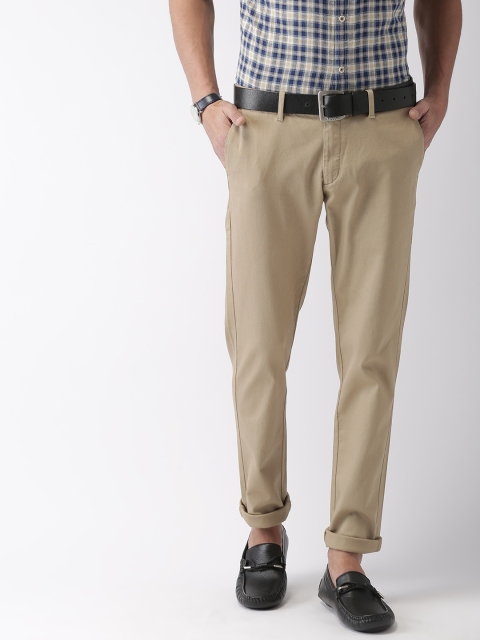 

Indian Terrain Men Khaki Brown Brooklyn Slim Fit Self Design Regular Trousers