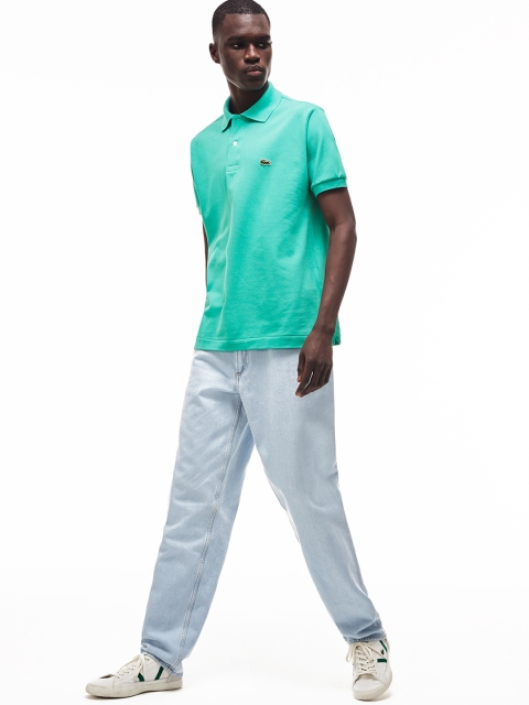 

Lacoste Men Sea Green Solid Polo T-shirt