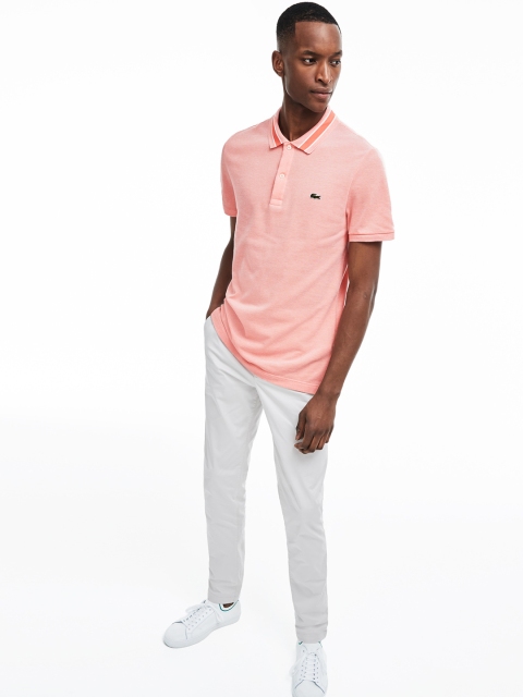 

Lacoste Men Pink Solid Polo Collar T-shirt