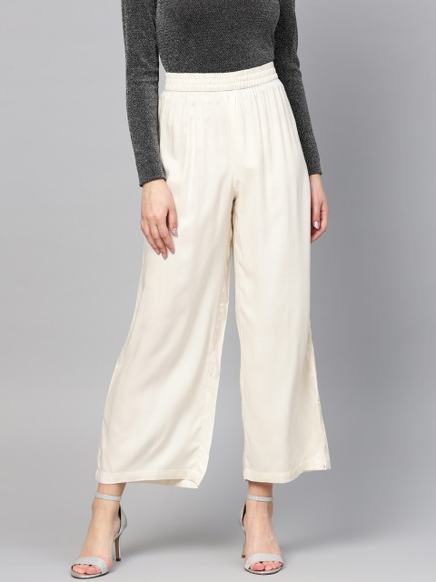 

Juniper Women Off-White Solid Wide Leg Palazzos