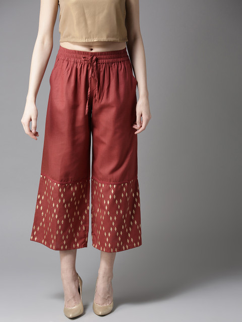 

Moda Rapido Women Rust Red Flared Solid Palazzos