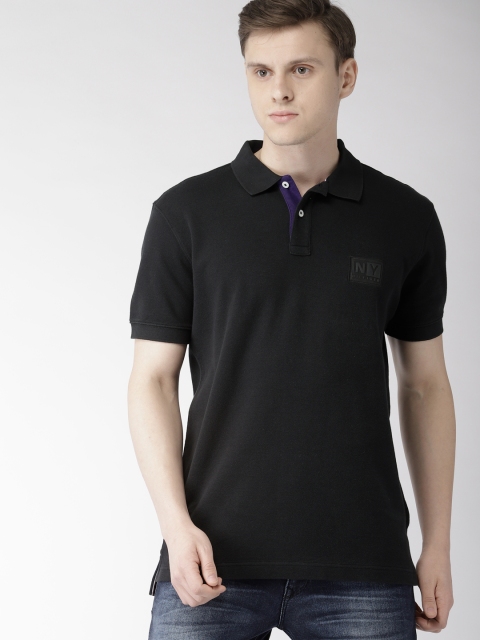 

Tommy Hilfiger Men Black Solid Polo Collar T-shirt