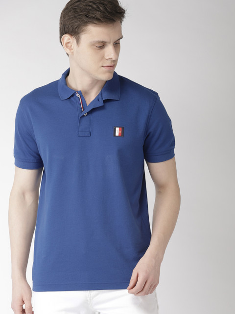 

Tommy Hilfiger Men Blue Solid Polo Collar T-shirt