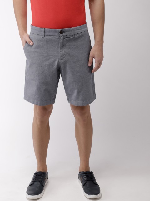 

Tommy Hilfiger Men Blue Solid Slim Fit Regular Shorts