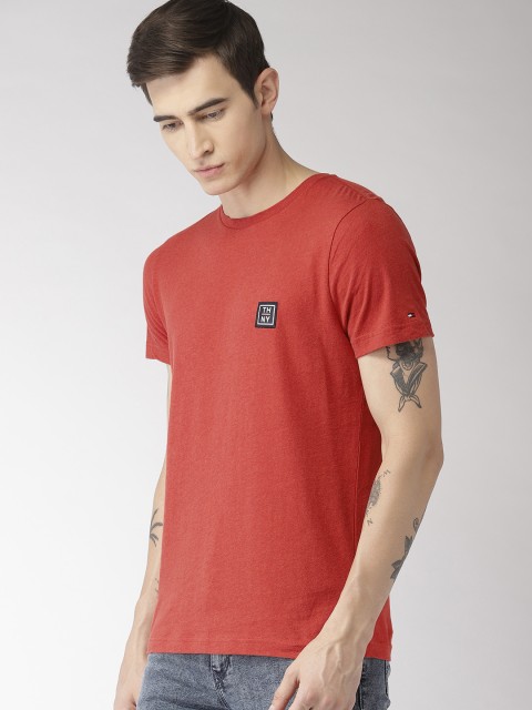 

Tommy Hilfiger Men Rust Orange Solid Round Neck T-shirt