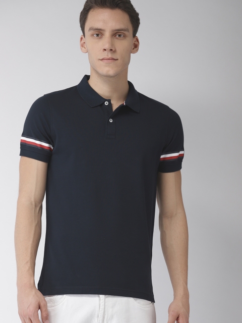 

Tommy Hilfiger Men Navy Blue Solid Polo Collar T-shirt