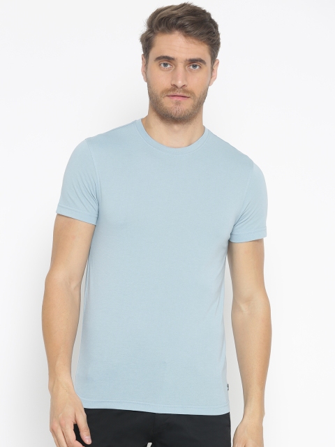 

Peter England Casuals Men Blue Solid Round Neck T-shirt