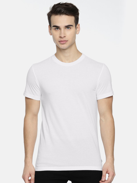 

Peter England Casuals Men White Solid Round Neck T-shirt