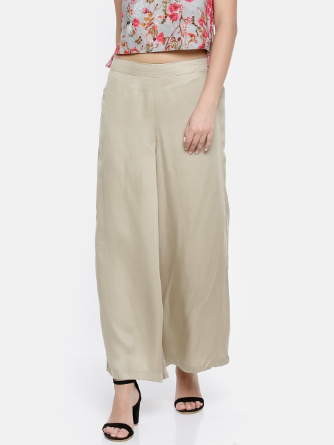 

Melange by Lifestyle Women Beige Flared Solid Palazzos