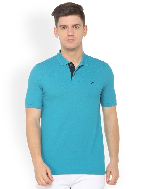 

Van Heusen Sport Men Blue Solid Polo Collar T-shirt