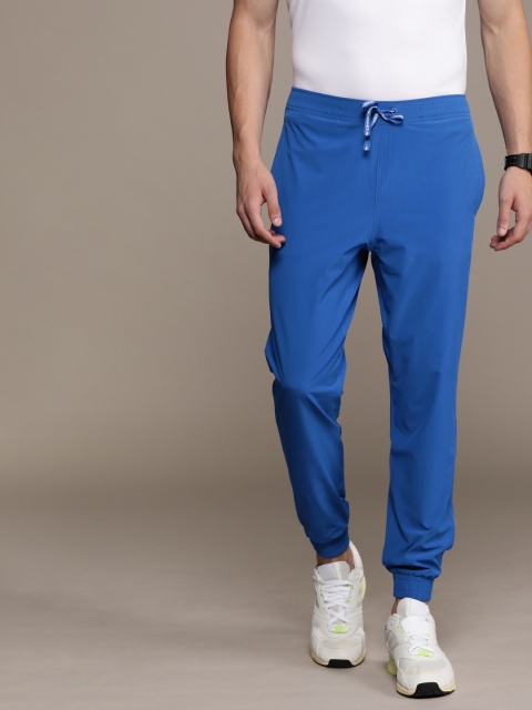 

Calvin Klein Performance Men Blue Solid Slim Fit Joggers