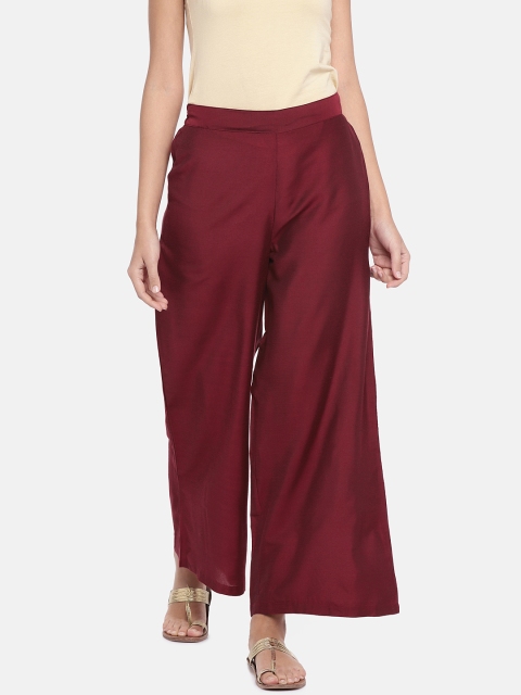 

Ethnicity Women Maroon Solid Flared Palazzos