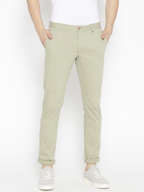 

Blackberrys Men Green Sharp Fit Solid Regular Trousers