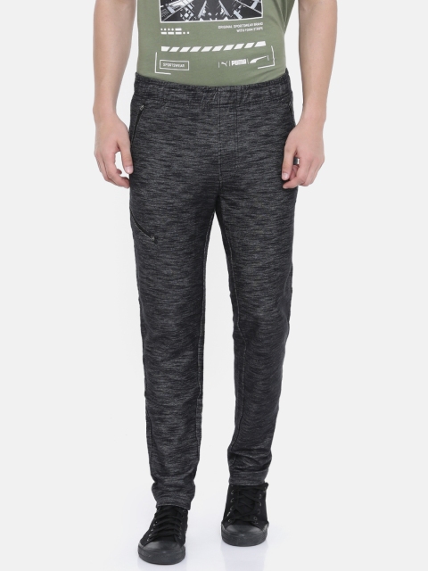 

Puma Men Black Solid Slim Fit Elevated Track Pants