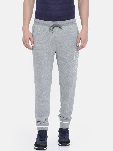 

Puma Men Grey Solid Regular Fit Athletics Pants TR Joggers
