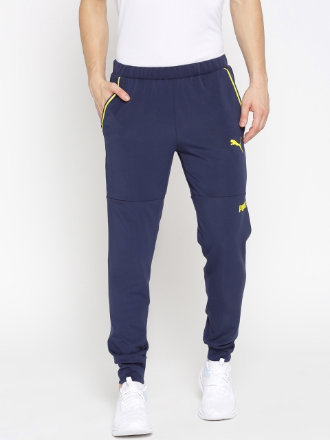

Puma Men Navy Blue Solid Slim Fit TEC CL. Peacoat Sports Track Pants
