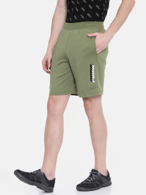 

Puma Men Olive Green Solid Regular Fit Sports Shorts Rebel Shorts 9" TR Olivine