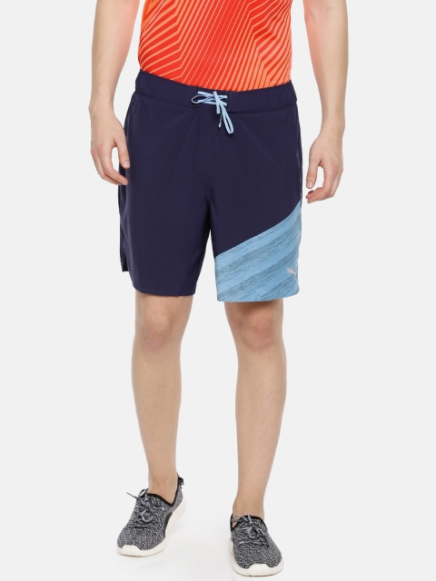 

Puma Men Navy Blue Solid PACE 7" 2in1 Sports DryCell Shorts