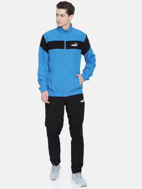 

Puma Men Blue & Black Solid Clean Woven Suit OP Indigo Bunting Sports Tracksuit