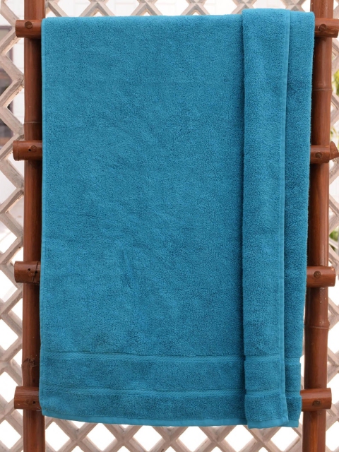 

Avira Home Blue Solid 560 GSM Bath Towel