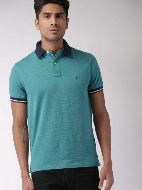 

Tommy Hilfiger Men Teal Blue Solid Polo T-shirt