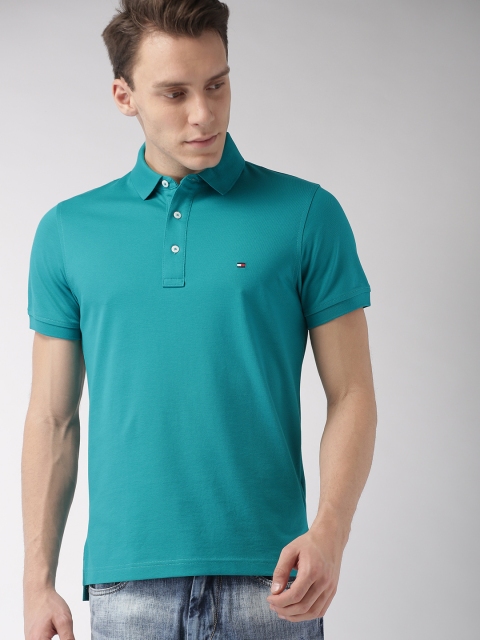 

Tommy Hilfiger Men Teal Solid Polo Collar T-shirt