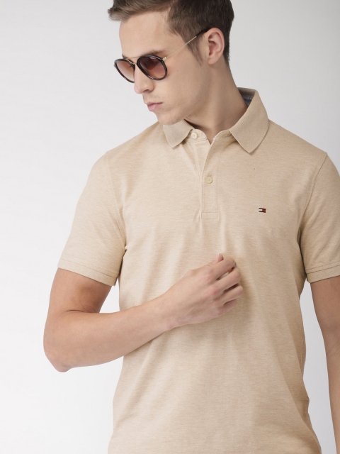 

Tommy Hilfiger Men Beige Solid Polo T-shirt