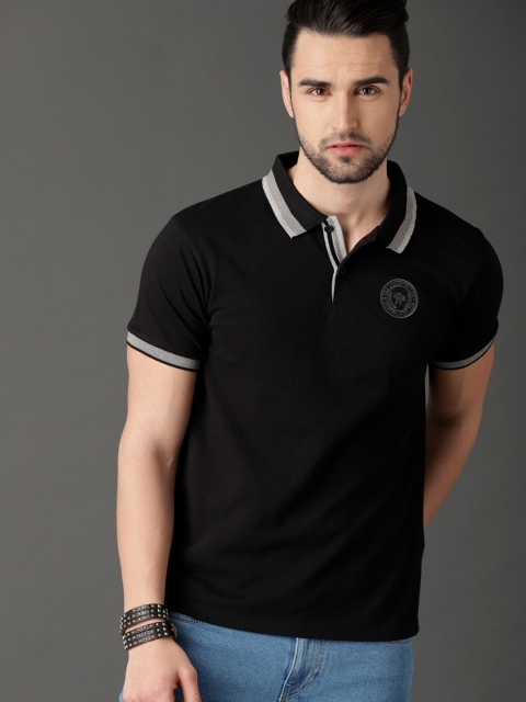 

Roadster Men Black Solid Polo T-shirt