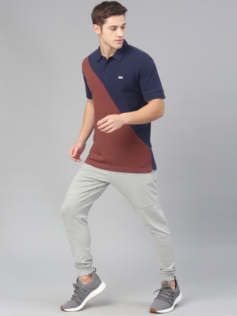 

HRX by Hrithik Roshan Men Navy Blue & Rust Colourblocked Polo Collar T-shirt