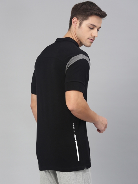 

HRX by Hrithik Roshan Men Black Solid Polo Collar T-shirt