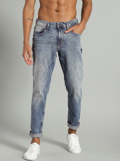 

Roadster Men Blue Carrot Regular Fit Mid-Rise Clean Look Stretchable Jeans