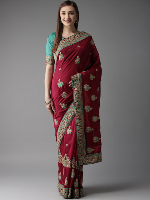 

MANOHARI Maroon & Golden Embroidered Saree