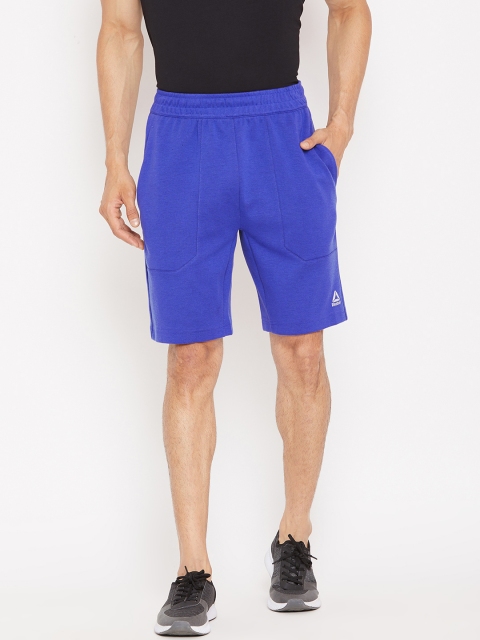 

Reebok Men Blue Solid WOR KN MEL Doubleknit Training Shorts