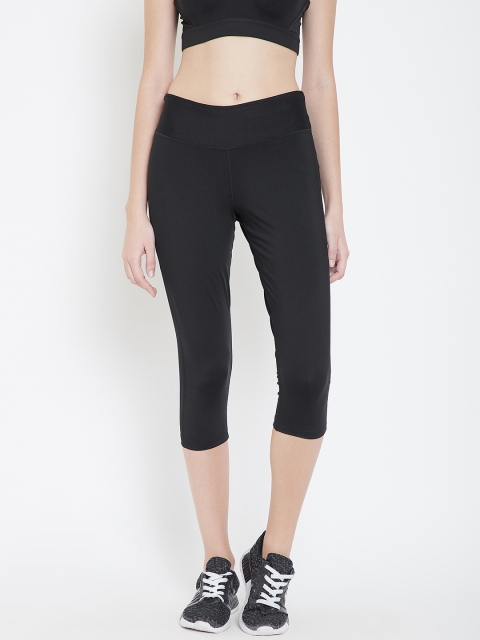 

Reebok Women Black Solid WOR PP Capri Tights