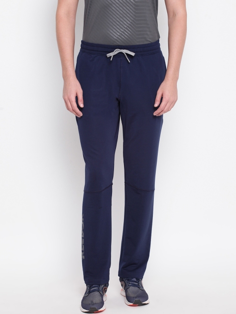 

Reebok Men Navy Blue Solid Workout Training Track Pants