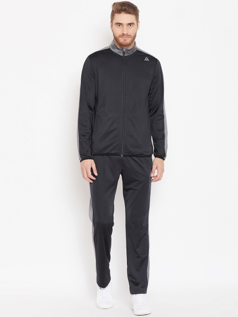 

Reebok Men Green & Black Solid Training Essentials Tricot Tracksuit