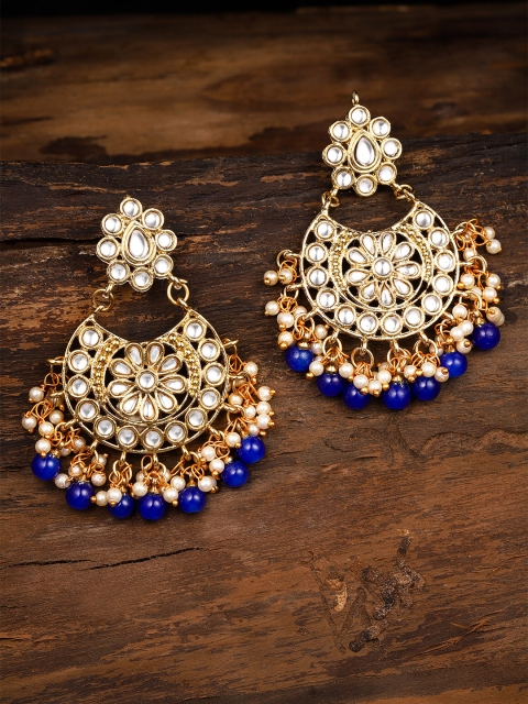 

Zaveri Pearls Gold-Toned & Blue Kundan Studded Crescent Shaped Chandbalis