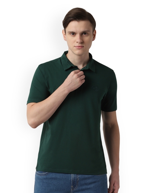 

Peter England Casuals Men Green Solid Polo Collar T-shirt