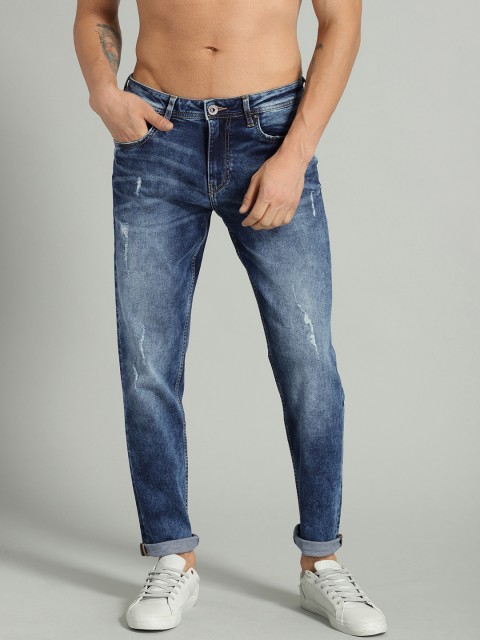 

Roadster Men Blue Carrot Fit Mid-Rise Mildly Distressed Stretchable Jeans