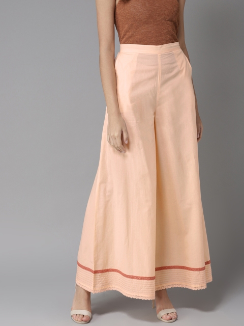 

Moda Rapido Women Peach-Coloured Flared Solid Palazzos