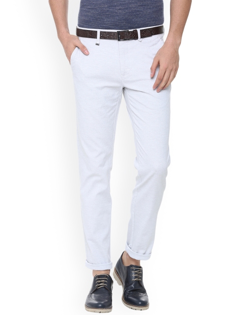 

Van Heusen Men White Slim Fit Solid Chinos