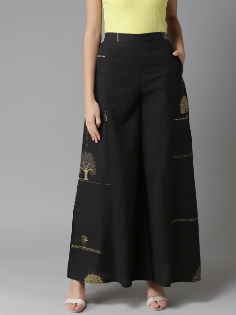 

Moda Rapido Women Black Printed Flared Palazzos