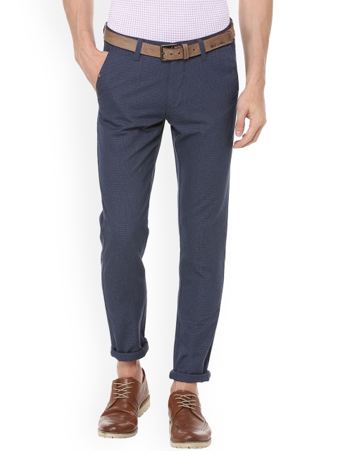 

Van Heusen Sport Men Blue Slim Fit Self Design Regular Trousers