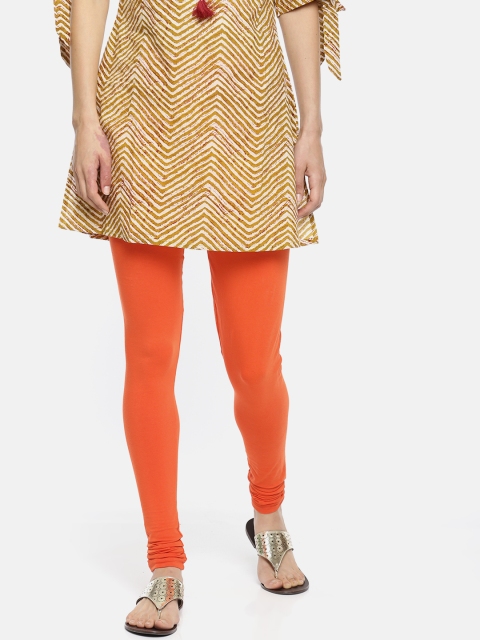 

Alena Women Orange Solid Churidar-Length Leggings